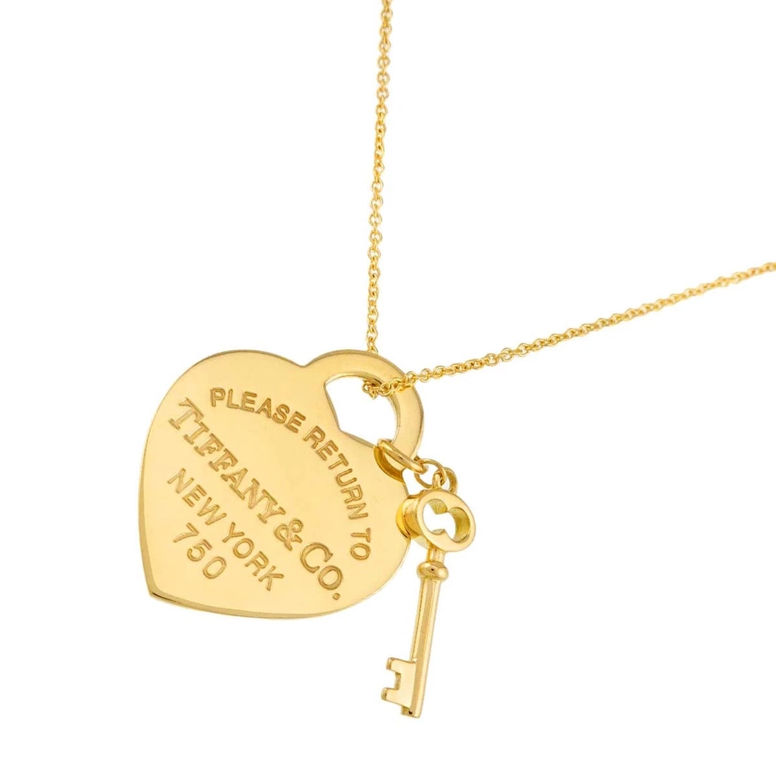 TIFFANY CO. RETURN TO HEART KEY NECKLACE: TIFFANY Co. Return to Heart key Necklace Brand: TIFFANY Co. Type: Necklace Material: 750 Yellow Gold, Color: Yellow Gold Size: internal circumference of the chain:15.7inch Largest motif Top