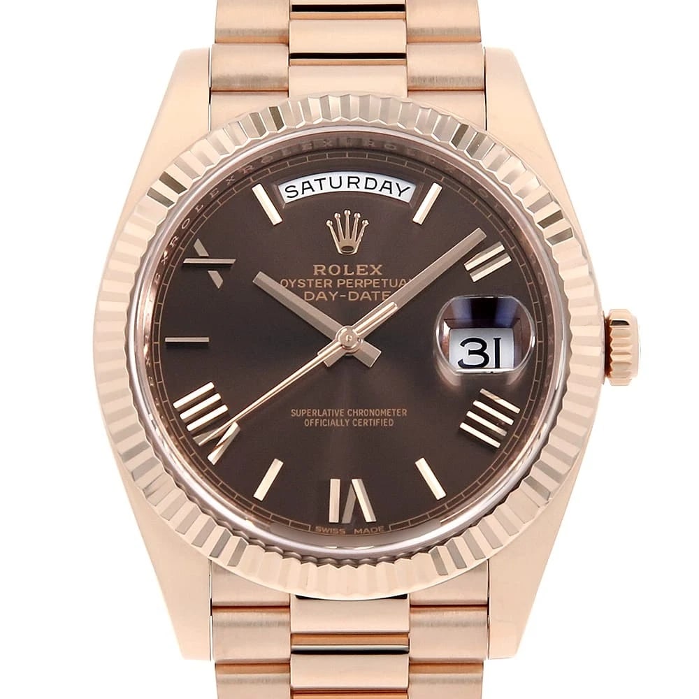 ROLEX CHOCOLATE BROWN WATCH: ROLEX Chocolate brown Watch Brand: ROLEX Type: Wrist watch Material: Band Material Everose Gold, Case Material Everose Gold Color: Dial Color Chocolate Brown Size: Case:W40mm Circumference of Wris