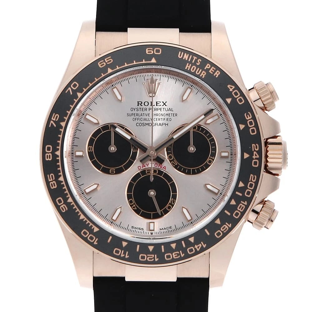 ROLEX COSMOGRAPH DAYTONA SUNDUST AND BLACK WATCH: ROLEX Cosmograph Daytona Sundust and black Watch Brand: ROLEX Type: Wrist watch Material: Band Material rubber, Case Material Everose Gold Color: Dial Color Sundust Size: Case:W40mm Circumference