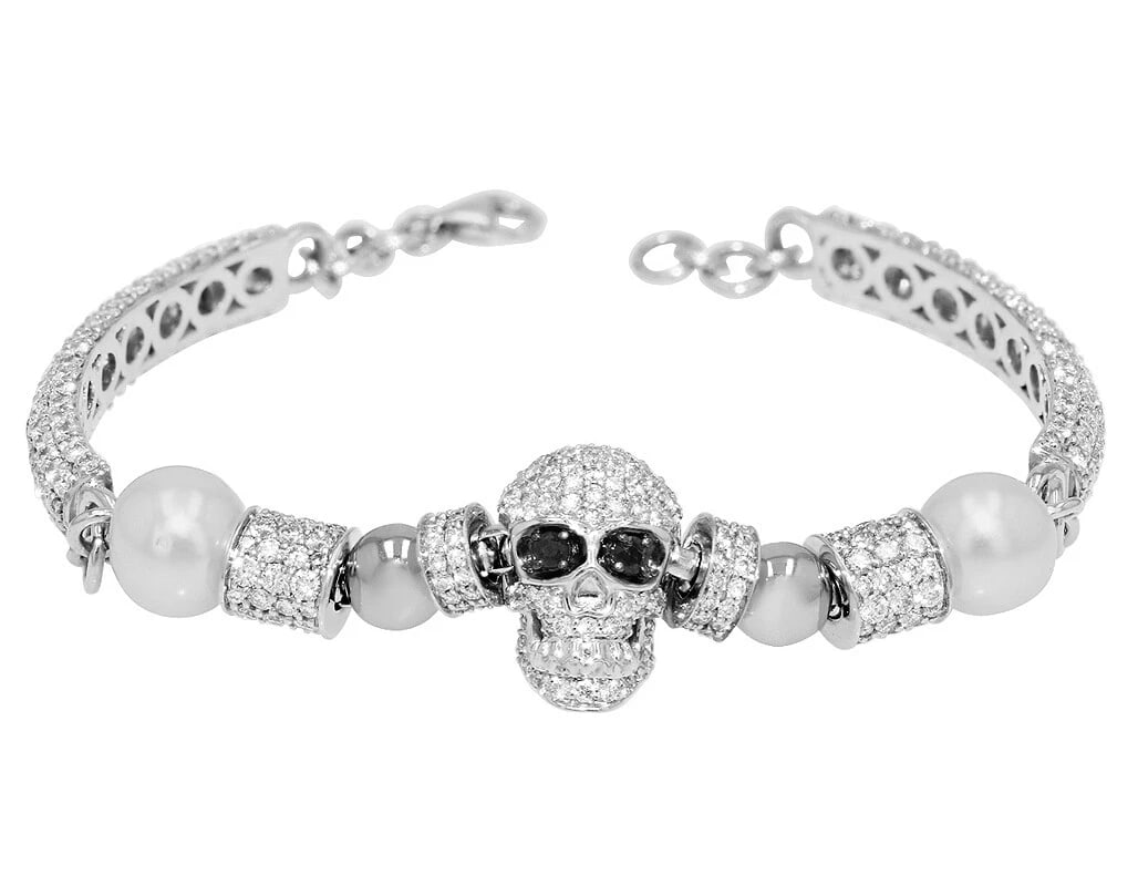 SKULL REAL DIAMOND PEARL BRACELET 10K WHITE GOLD: Skull Real Diamond Pearl Bracelet 10K White Gold Brand: None Type: Bracelet Material: 10K White Gold, Color: White Size: Dimension L 7.5" x W 13mm Accessories: None Accessories Notice: Whe