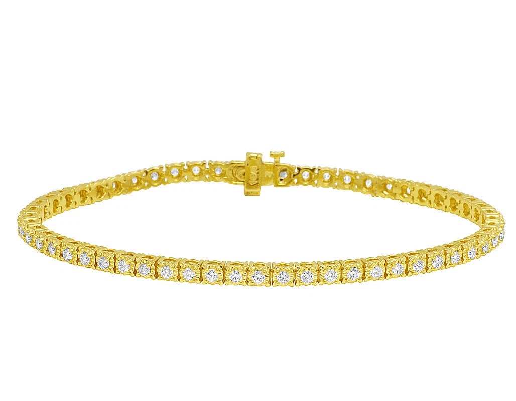 YELLOW GOLD 1 ROW TENNIS GENUINE DIAMOND SET BRACELET: Yellow Gold 1 Row Tennis Genuine Diamond Set Bracelet Brand: None Type: Bracelet Material: 10K Yellow Gold, Main Stone/Creation Natural Color: Yellow Gold Size: Length 8 in Width 4MM 