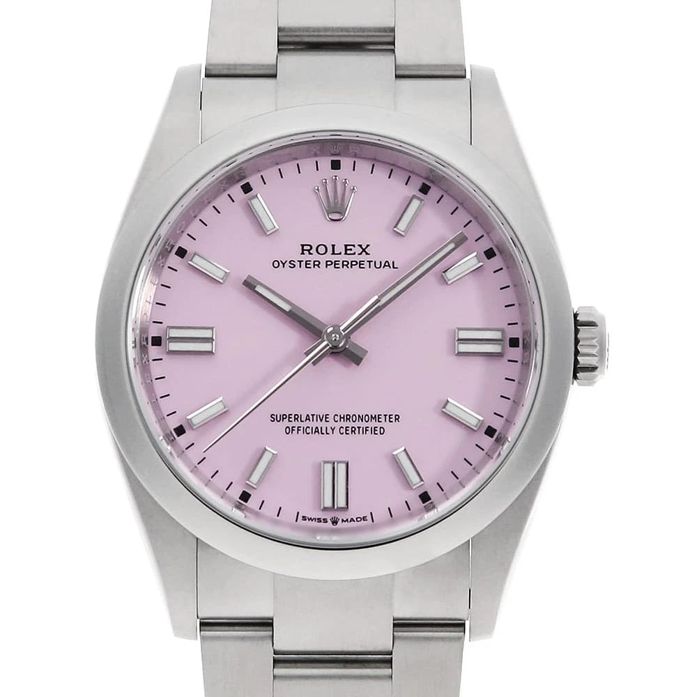 ROLEX OYSTER PERPETUAL CANDY PINK WATCH: ROLEX Oyster Perpetual Candy pink Watch Brand: ROLEX Type: Wrist watch Material: Band Material Stainless Steel, Case Material Stainless Steel Color: Dial Color Candy Pink Size: Case:W36mm