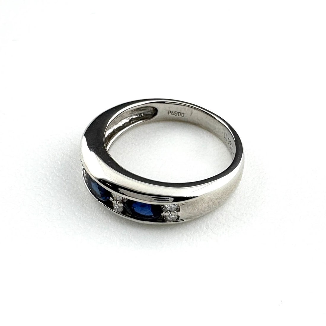 SAPPHIRE DESIGN RING PLATINUM MELEE DIAMOND: Sapphire Design Ring Platinum Melee Diamond Brand: Unbranded Type: Ring Material: Pt900, Main Stone/Creation sapphire Color: Platinum Size: US6 Accessories: None Accessories Notice: When p