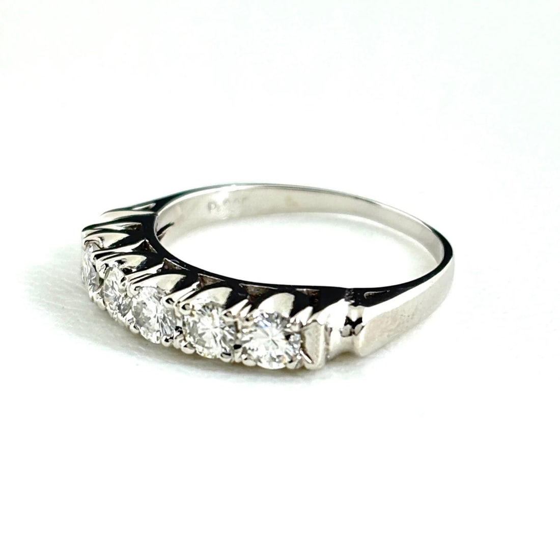 MELEE DIAMOND DESIGN RING PLATINUM: Melee Diamond Design Ring Platinum Brand: Unbranded Type: Ring Material: Pt900, Main Stone/Creation Natural Color: Platinum Size: US5 Accessories: None Accessories Notice: When purchasing