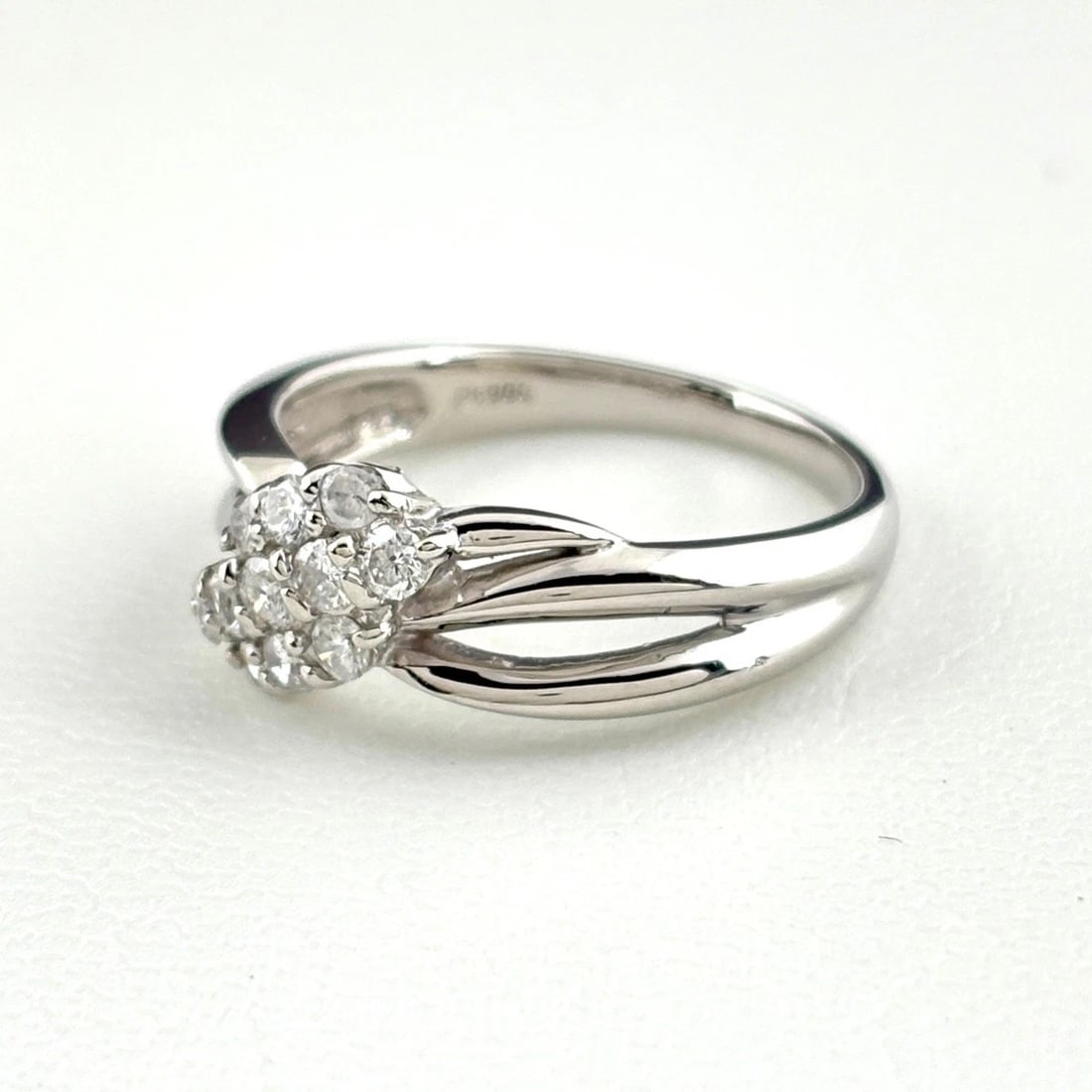 MELEE DIAMOND DESIGN RING PLATINUM: Melee Diamond Design Ring Platinum Brand: Unbranded Type: Ring Material: Pt900, Color: Platinum Size: US6 Accessories: None Accessories Notice: When purchasing pre-owned goods, please refe