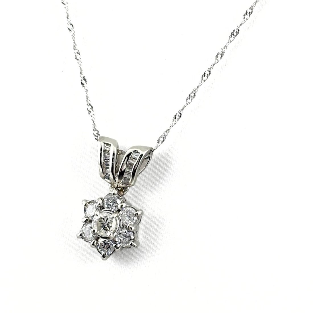 MELEE DIAMOND DESIGN NECKLACE PLATINUM: Melee Diamond Design Necklace Platinum Brand: Unbranded Type: Necklace Material: Pt900, Color: Platinum Size: Chain / code 40cm(15.7") Total length of the pendant head including a bail 18.2×8.3mm