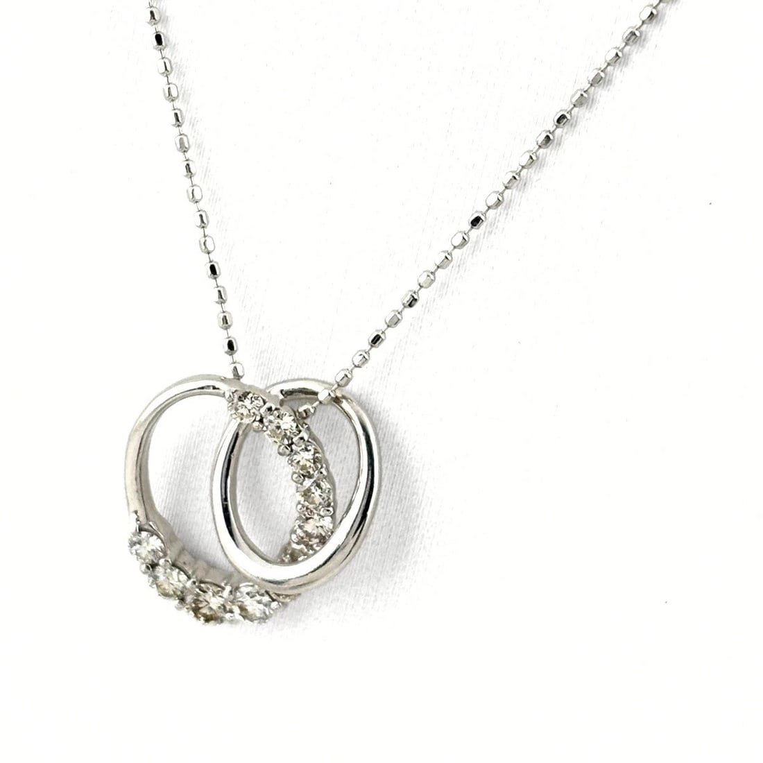 MELEE DIAMOND DESIGN NECKLACE WG: Melee Diamond Design Necklace Wg Brand: Unbranded Type: Necklace Material: 18K, Color: WhiteGold Size: Chain / code 51cm(20.1") Pendant size 15.6×14.0mm(0.6") Accessories: None Accessories