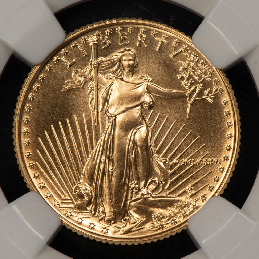 1986 G$10 1/4 OZ GOLD AMERICAN EAGLE: 1986 G$10 1/4 oz Gold American Eagle Brand/Mint: U.S. Mint Year: 1986 Fineness: 0.9167 Country of Origin: United States Accessories: None Accessories Notice: When purchasing pre-owned goods, pleas