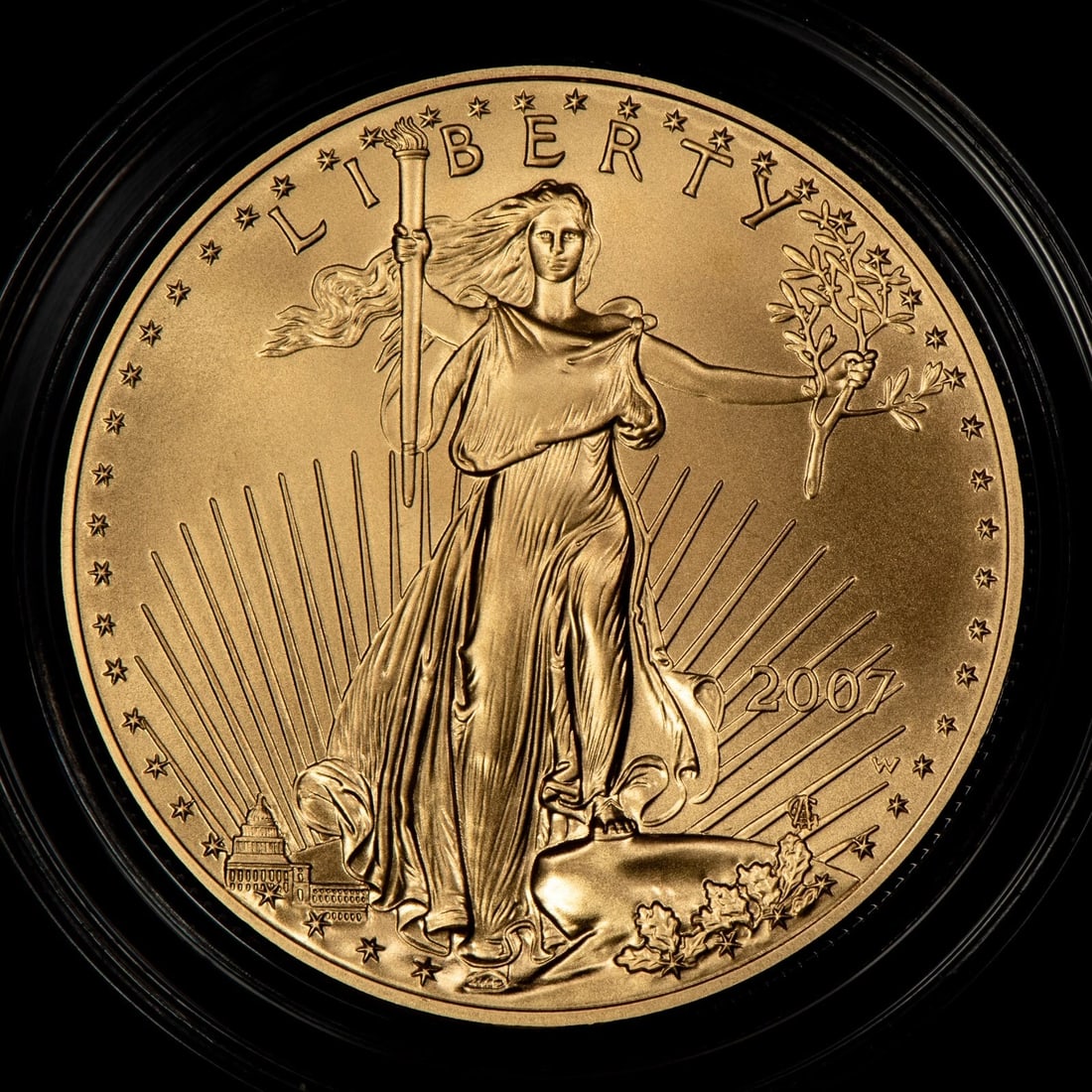 2007-W G$50 1 OZ GOLD AMERICAN EAGLE: 2007-W G$50 1 oz Gold American Eagle Brand/Mint: U.S. Mint Year: 2007 Fineness: 0.9167 Country of Origin: United States Accessories: None Accessories Notice: When purchasing pre-owned goods, pleas