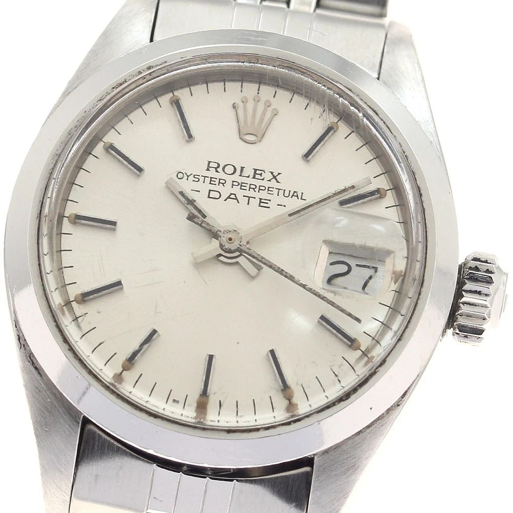ROLEX OYSTER PERPETUAL DATE SILVER DIAL AUTOMATIC LADIES: ROLEX Oyster perpetual date Silver Dial Automatic Ladies Brand: ROLEX Type: Wristwatch Material: Band Material Stainless Steel, Case Material Stainless Steel / Stainless Steel Color: Band Color