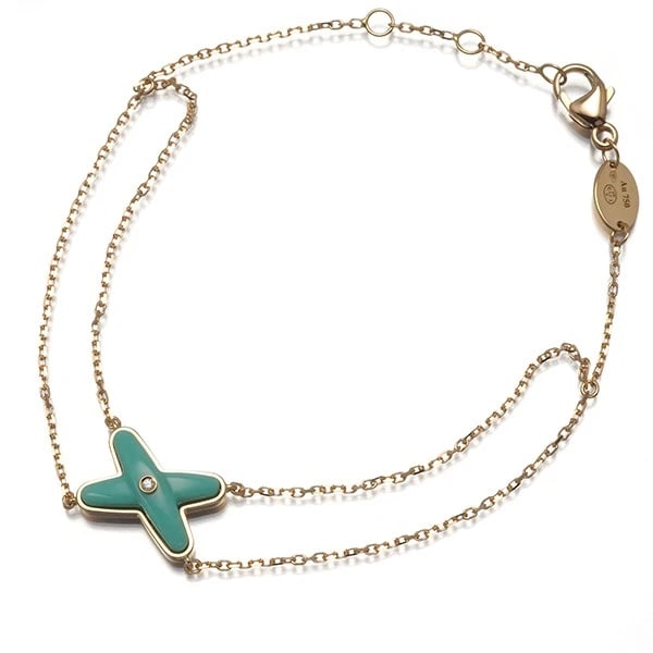 CHAUMET BRACELET TURQUOISE DIAMOND JEUX DE LIENS: CHAUMET Bracelet Turquoise Diamond Jeux de Liens Brand: CHAUMET Type: Bracelet Material: 18K / 750 / Rose Gold Main Stone/Creation Natural Color: Rose Gold Size: Inner circumference: 15 / 16 / 17cm De