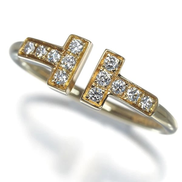 TIFFANY&CO. RING DIAMOND TIFFANY T WIRE: Tiffany&Co. Ring Diamond Tiffany T Wire Brand: Tiffany & Co. Type: Ring Material: 18K / 750 / Yellow Gold Main Stone/Creation Natural Color: Yellow Gold Size: US5.25-5.5 Accessories: None