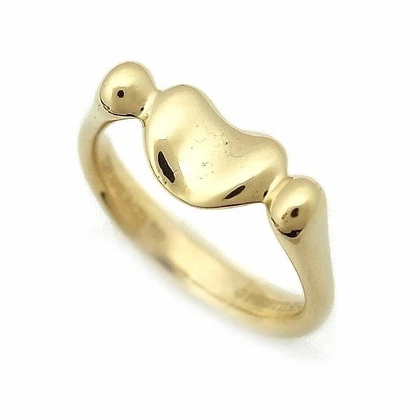 TIFFANY & CO. ELSA PERETTI BEAN RING: Tiffany & Co. Elsa Peretti Bean Ring Brand: Tiffany & Co. Type: Ring Material: 18K Yellow Gold (K18YG) Color: Yellow Gold Size: US: 4.5 Accessories: None Accessories Notice: When purchasin