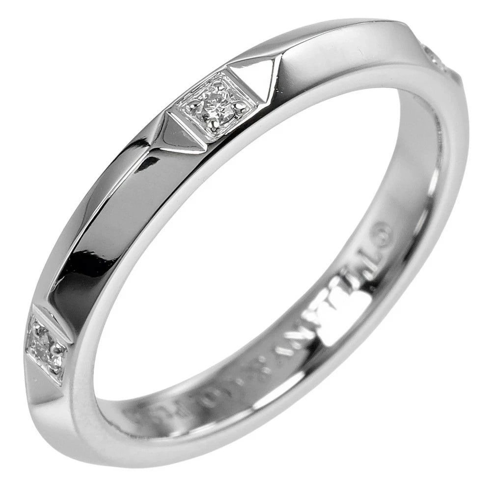 TIFFANY & CO. TRUE RING PT950 PLATINUM DIAMOND: Tiffany & Co. True Ring Pt950 Platinum Diamond Brand: Tiffany & Co. Type: Ring Material: Platinum (Pt950) Main Stone/Creation Natural Color: Silver Size: US 4.25 Accessories: None Accessor