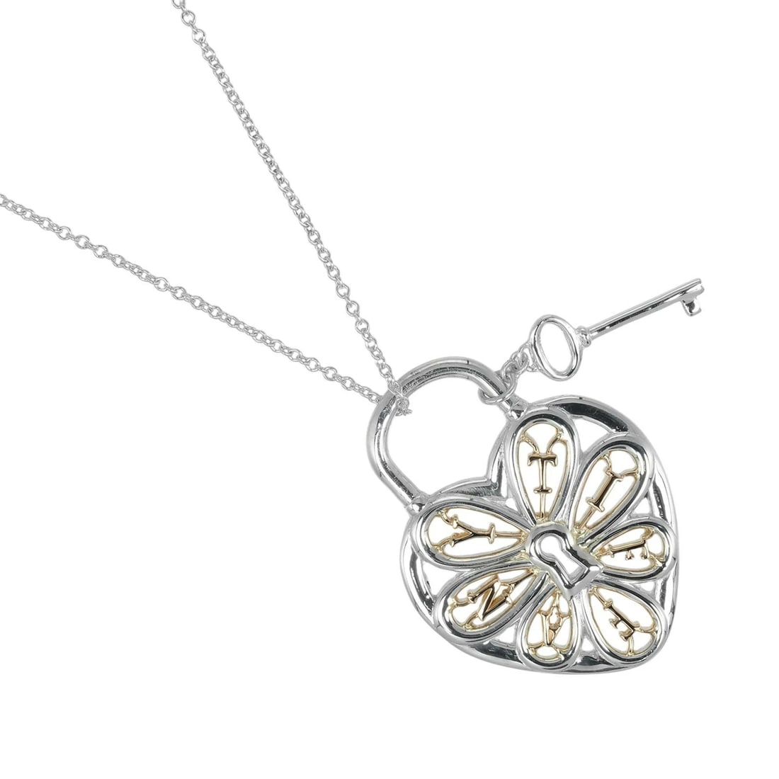 TIFFANY & CO. FILIGREE HEART KEY NECKLACE: Tiffany & Co. Filigree Heart Key Necklace Brand: Tiffany & Co. Type: Necklace Material: Sterling Silver (925) / K18 Pink Gold (750) Color: Sterling Silver / Pink Gold Size: Chain Length: Approx. 1