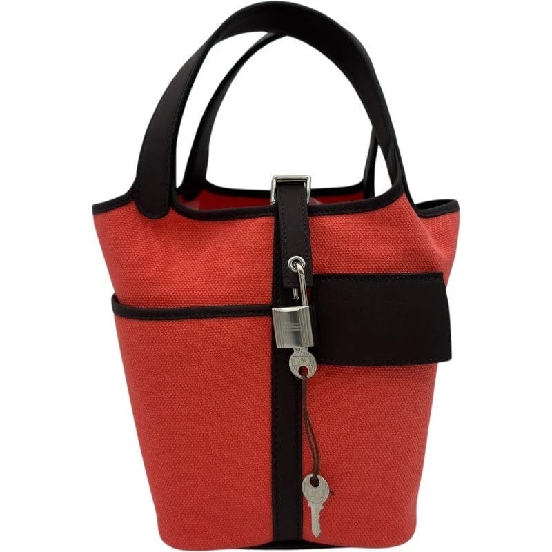 HERMES PICOTAN LOCK PM CARGO HANDBAG: HERMES Picotan Lock PM Cargo Handbag Brand: HERMES Type: Handbag Material: Twargoelan Swift Color: Rouge Serie SVHardware Size: W7.1 x H7.1x D5.1inch Accessories: None Accessories Notice:
