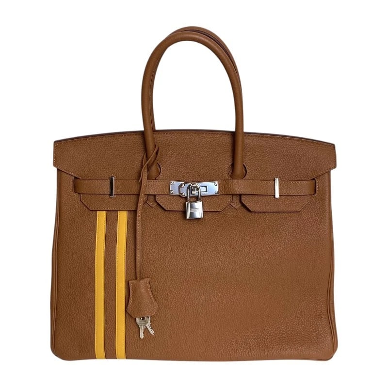 HERMES BIRKIN 35 HANDBAG: HERMES Birkin 35 Handbag Brand: HERMES Type: Handbag Material: Togo/Swift Color: Gold x Jaune Ambre SilverHardware Size: W13.8 x H11.0x D7.1inch Accessories: None Accessories Notice: When