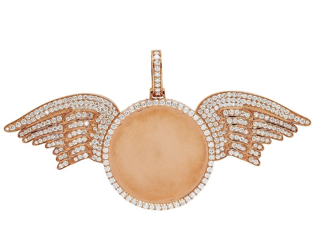 CIRCLE FRAME REAL DIAMOND PHOTO WING MEMORY PENDANT: Circle Frame Real Diamond Photo Wing Memory Pendant Brand: None Type: Pendant Material: 10K Rose Gold Main Stone/Creation Natural Color: Rose Gold Size: Dimension 2.2" x 3.95" Accessories: None