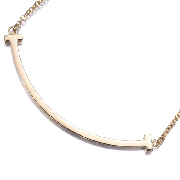 TIFFANY&CO. NECKLACE TIFFANY T SMILE SMALL: Tiffany&Co. Necklace Tiffany T Smile Small Brand: Tiffany & Co. Type: Necklace Material: 18K / 750 / Rose Gold Color: Rose Gold Size: Necklace length: 41 / 45cm Pendant size: 9.4 x 37.0mm 