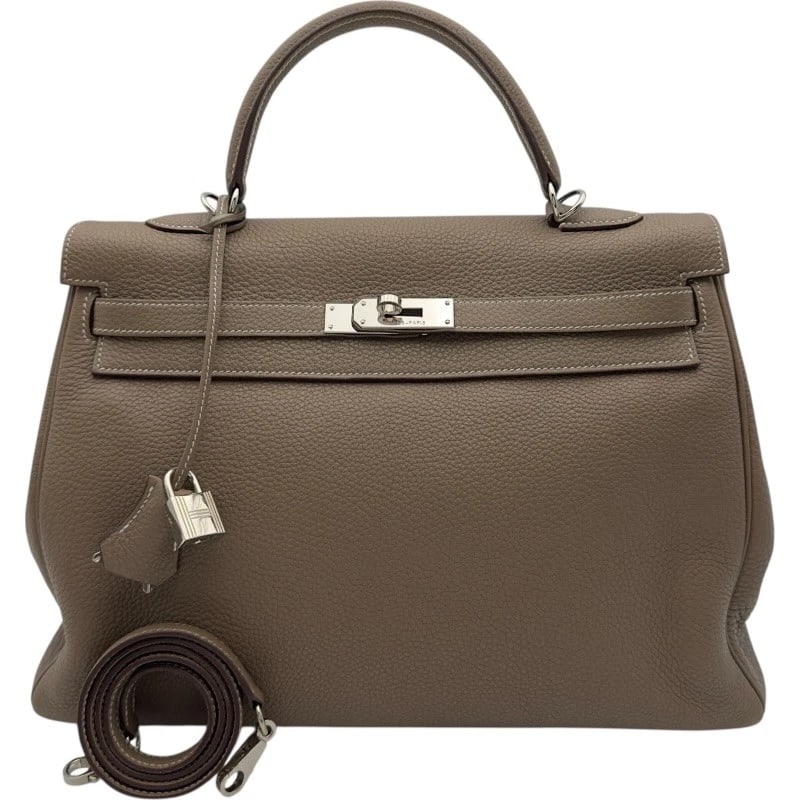 HERMES KELLY 35 INTERNAL SEWING HANDBAG: HERMES Kelly 35 internal sewing Handbag Brand: HERMES Type: Handbag Material: Taurillon Clemence Color: Etop SilverHardware Size: W13.8 x H9.4x D5.1inch Accessories: None Accessories Notic