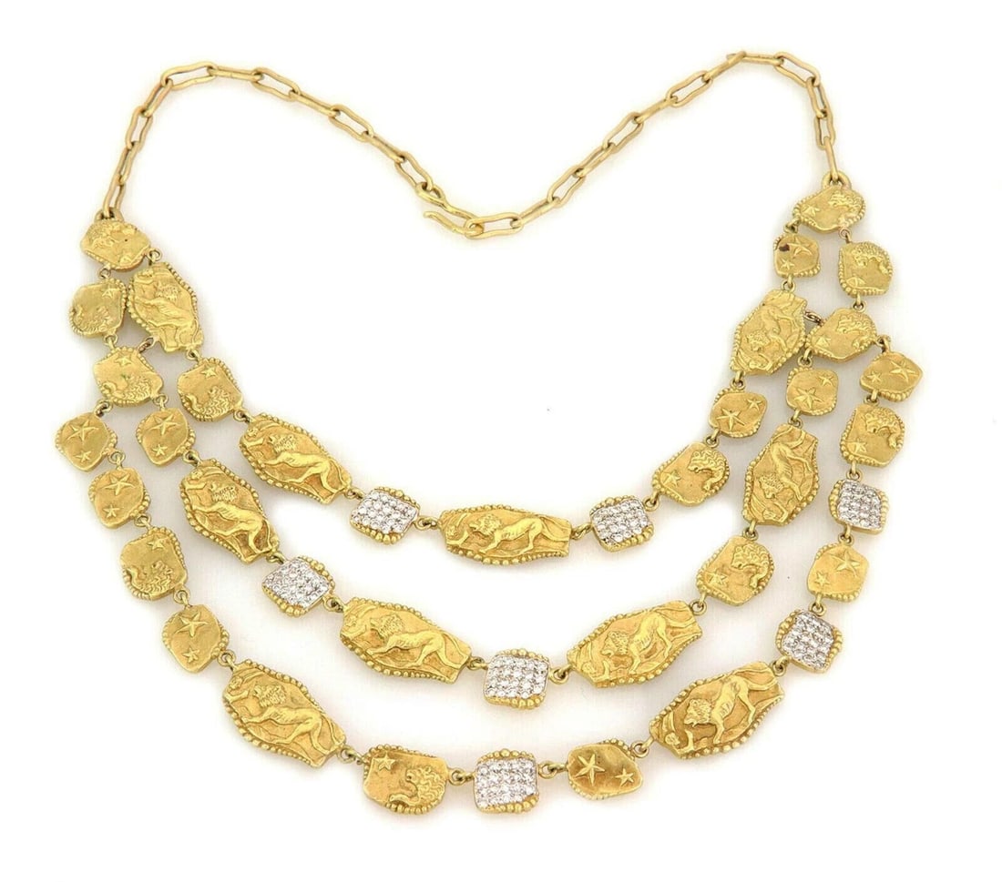 SEIDENGANG ATHENA NECKLACE TRIPLE STRAND: SeidenGang Athena Necklace Triple Strand Brand: SeidenGang Type: Necklace Material: 18k yellow gold Main Stone/Creation Gemstones: Color: None Size: Measurement: chain approximately 18" long x 0.1