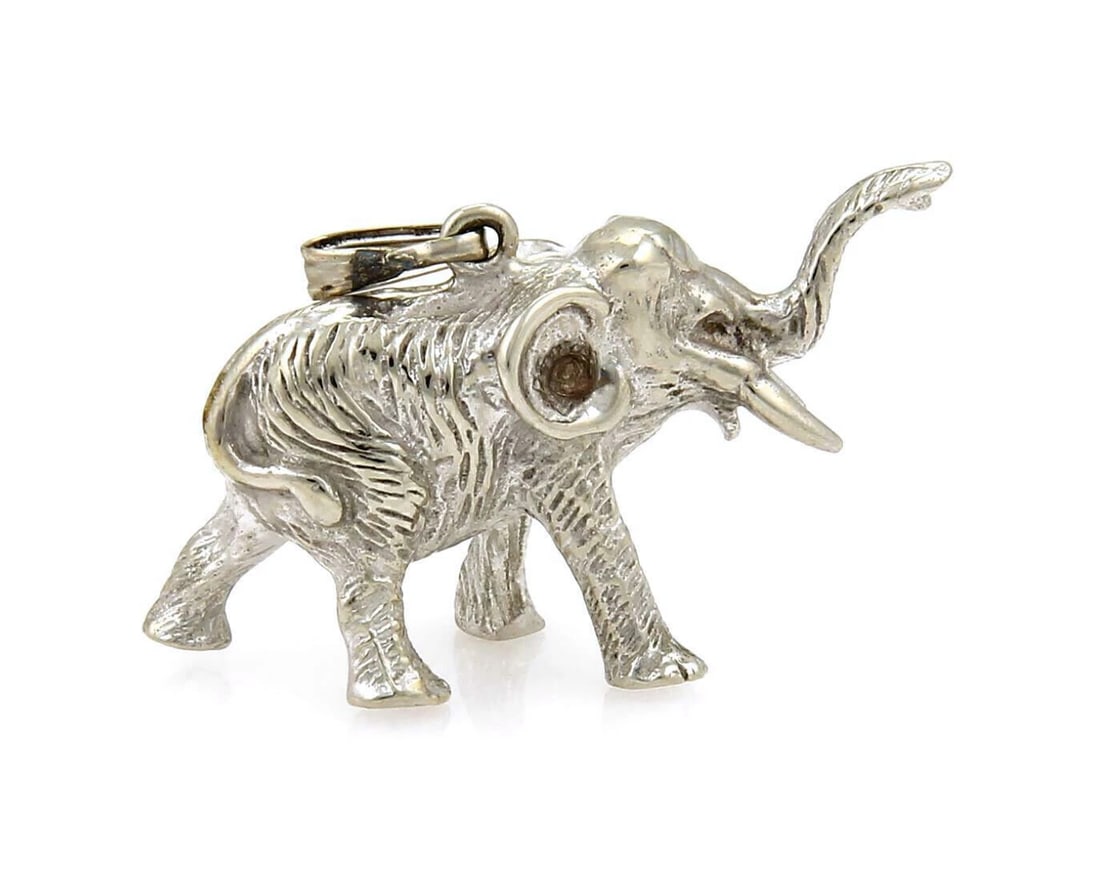 ELEPHANT 18K WHITE GOLD FULL FIGURE CHARM PENDANT: Elephant 18k White Gold Full Figure Charm Pendant Brand: Unbranded Type: Pendant Material: 18k white gold Color: white Size: Measurement: 0.96" tall w/bail x 1.45" long x 0.46" Accessories: None