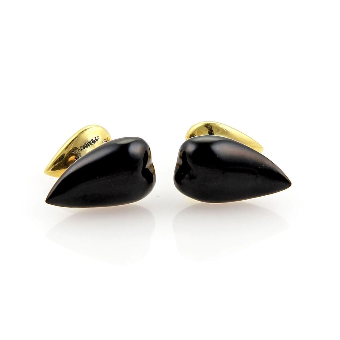 TIFFANY & CO. PERETTI ONYX STUD CUFFLINKS: Tiffany & Co. Peretti Onyx Stud Cufflinks Brand: Tiffany & Co. Type: Stud Cufflinks Material: 18k Yellow Gold Color: Yellow Size: Measurement: Top: 19mm long x 11mm wide x 6mm Accessories: