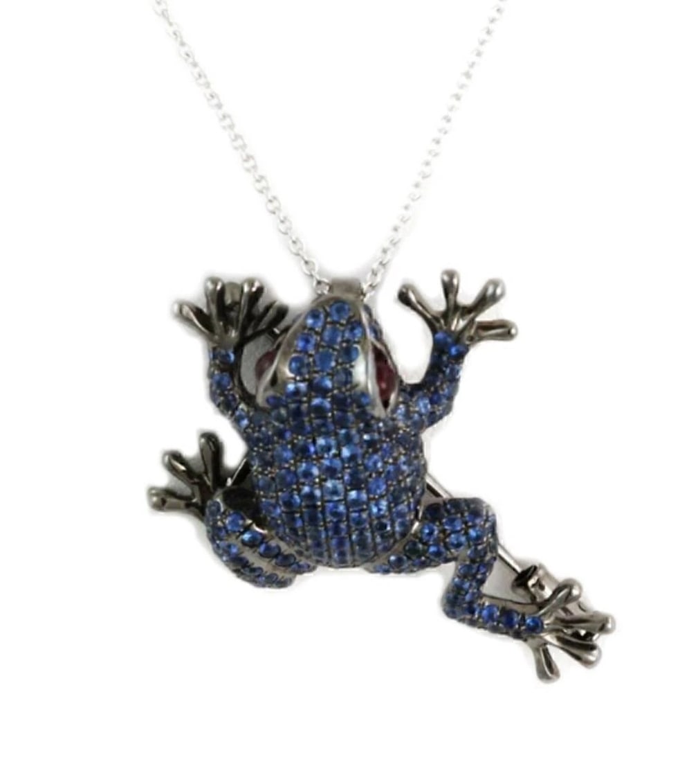 SAPPHIRE & RUBY FROG BROOCH PIN NECKLACE: Sapphire & Ruby Frog Brooch Pin Necklace Brand: Unbranded Type: Brooch Material: 18k white and black rhodium gold Main Stone/Creation Sapphire & Ruby Color: None Size: Measurement: Chain