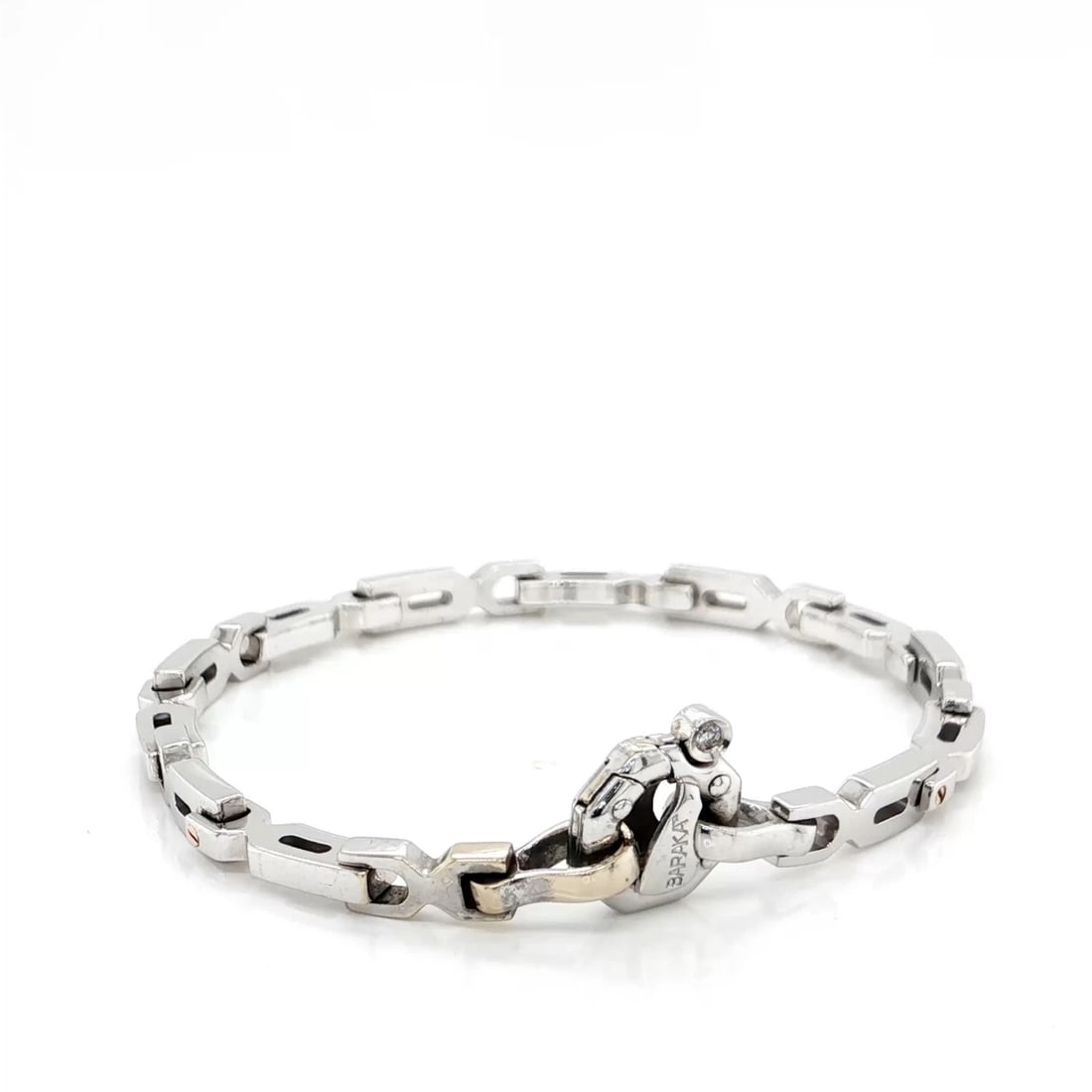 BARAKA FANCY LINK CHAIN BRACELET: Baraka Fancy Link Chain Bracelet Brand: Baraka Type: Bracelet Material: 18k White & Rose Gold Color: None Size: Length: 7" Accessories: None Accessories Notice: When purchasing pre-owned