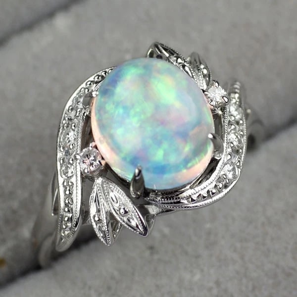 PT850 OPAL DIAMOND RING: Pt850 opal diamond ring Brand: None Type: ring Material: Pt850 Color: none Size: 6.75 - 7 US Accessories: None Accessories Notice: When purchasing pre-owned goods, please refer to the photos