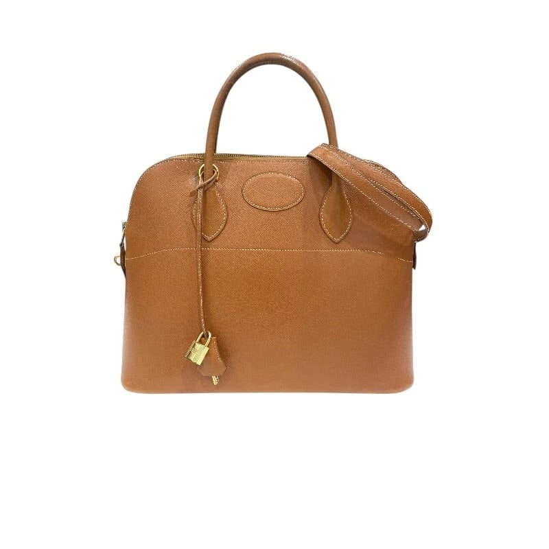 HERMES BOLIDE 35 HANDBAG CUIR CLEMENCE GOLD HARDWARE: HERMES Bolide 35 Handbag Cuir Clemence Gold Hardware Brand: HERMES Type: Womwns Bag Material: Cushvel Color: Gold-gold hardware Size: Width (approx.): 35cm Height (approx.): 27cm Depth (approx.):