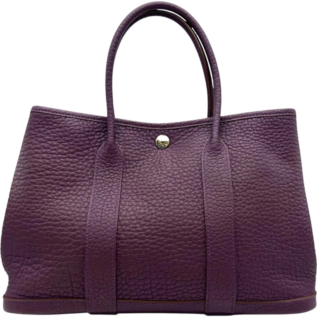 HERMES GARDEN PARTY TPM HANDBAG: HERMES Garden Party TPM Handbag Brand: HERMES Type: Womwns Bag Material: fjord Color: Cassis silver hardware Size: Width (approx.): 30cm Height (approx.): 21cm Depth (approx.): 13cm Accessories: