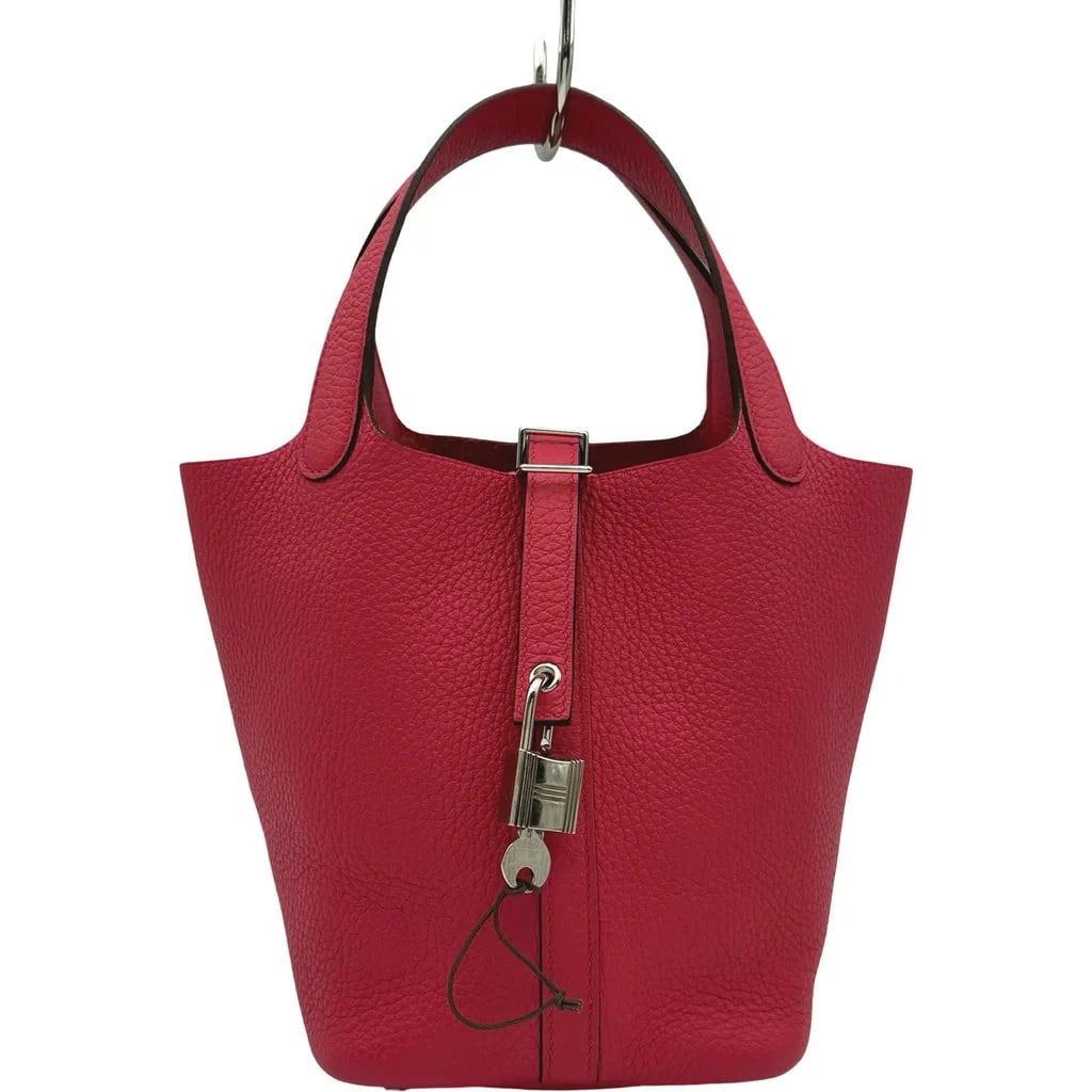 HERMES PICOTIN LOCK PM TOGO HANDBAG: HERMES Picotin Lock PM Togo Handbag Brand: HERMES Type: Handbag Material: Taurillon Color: Rose Extreme Silver Hardware Size: Width (approx.): 18cm Height (approx.): 18cm Depth (approx.): 13cm Ac