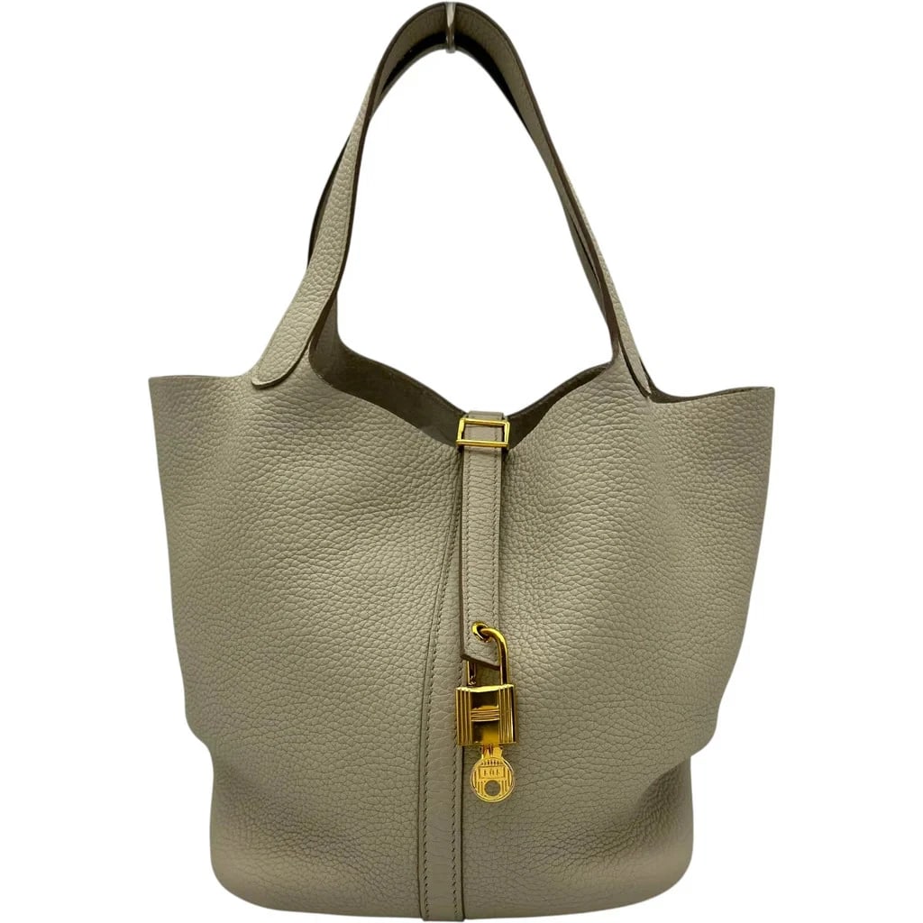 HERMES PICOTIN LOCK MM B STAMP TOGO LEATHER BETON GOLD HARDWARE HANDBAG: HERMES Picotin Lock MM B Stamp Togo Leather Beton Gold Hardware Handbag Brand: HERMES Type: Womwns Bag Material: Taurillon Color: Beton gold hardware Size: Width (approx.): 22cm Height (approx.):