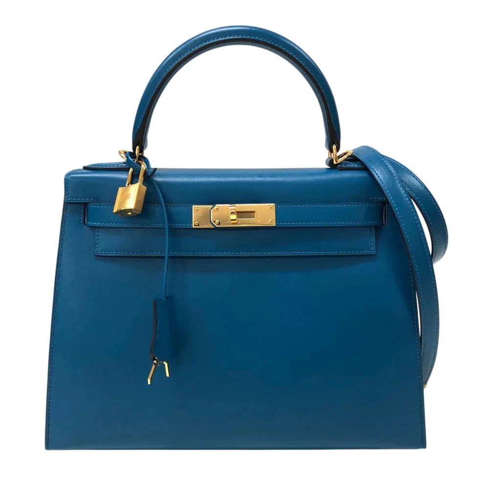 HERMES KELLY 28 C BLUE IZMIR TADELAKT SHOULDER BAG: HERMES Kelly 28 C Blue Izmir Tadelakt Shoulder Bag Brand: HERMES Type: Womwns Bag Material: Tadelakt Color: Blue Izmir Gold hardware Size: Width (approx.): 28cm Height (approx.): 20cm Depth (appro