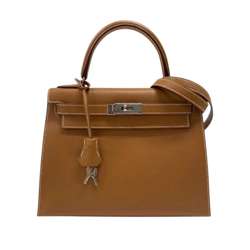 HERMES KELLY 28 HANDBAG TOGO LEATHER: HERMES Kelly 28 Handbag Togo Leather Brand: HERMES Type: Womwns Bag Material: Gold and silver hardware Color: Gold and silver hardware Size: Width (approx.): 29cm Height (approx.): 21cm Depth (app