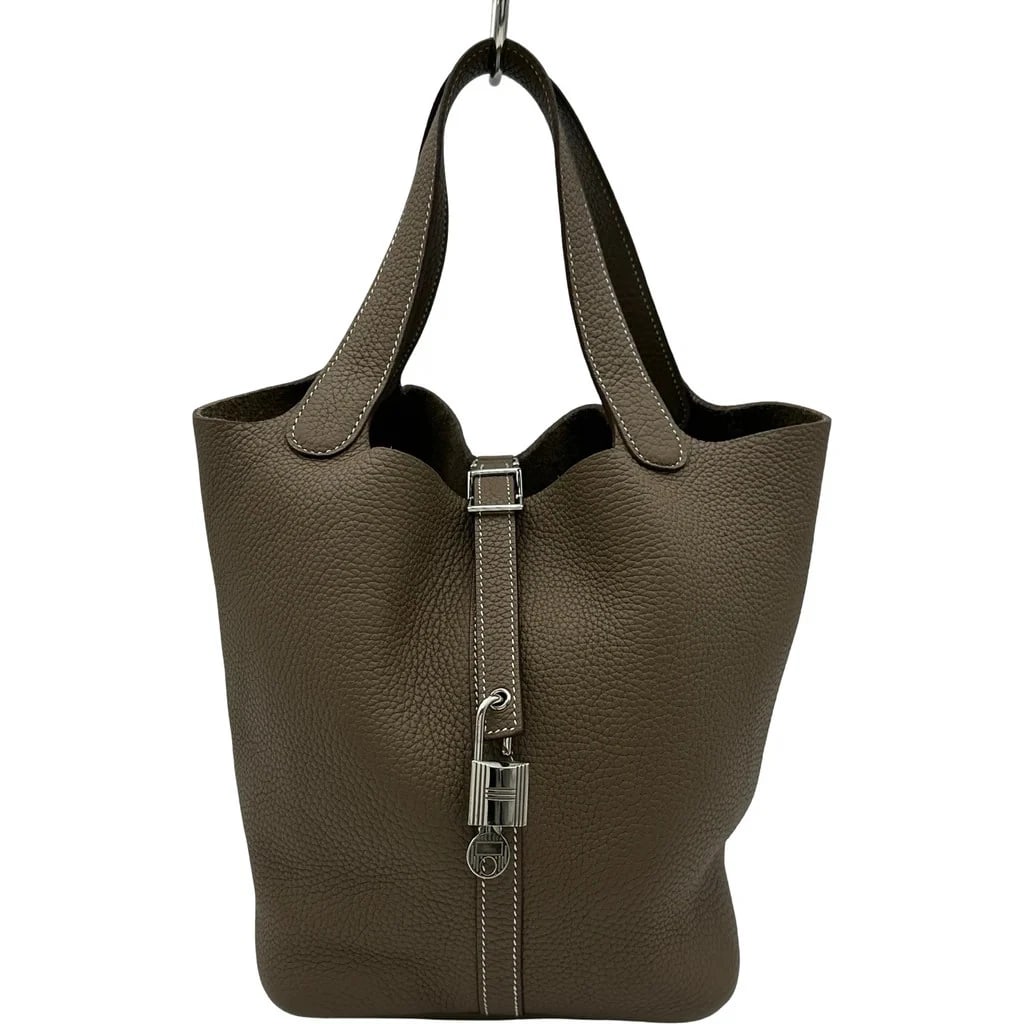 HERMES PICOTIN LOCK MM Z STAMP TOGO HANDBAG: HERMES Picotin Lock MM Z Stamp Togo Handbag Brand: HERMES Type: Womwns Bag Material: Taurillon Color: Etoupe with silver hardware Size: Width (approx.): 22cm Height (approx.): 22cm Depth (approx.)