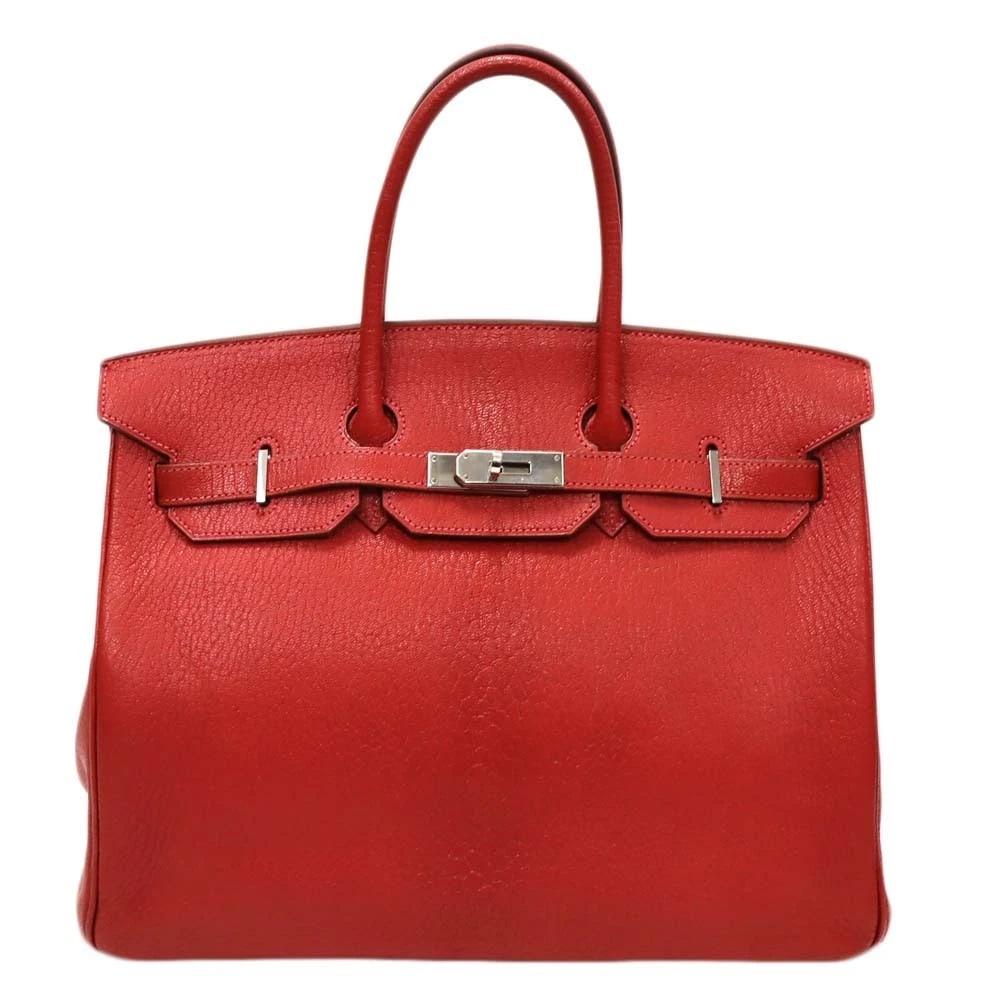HERMES BIRKIN 35 TOTE BAG SHEEPSKIN VERMILION: Hermes Birkin 35 Tote Bag Sheepskin Vermilion Brand: HERMES Type: Womwns Bag Material: Chevre Coromandel (young goat leather) Color: Vermilion (red) Silver hardware Size: Width (approx.): W35cm cm