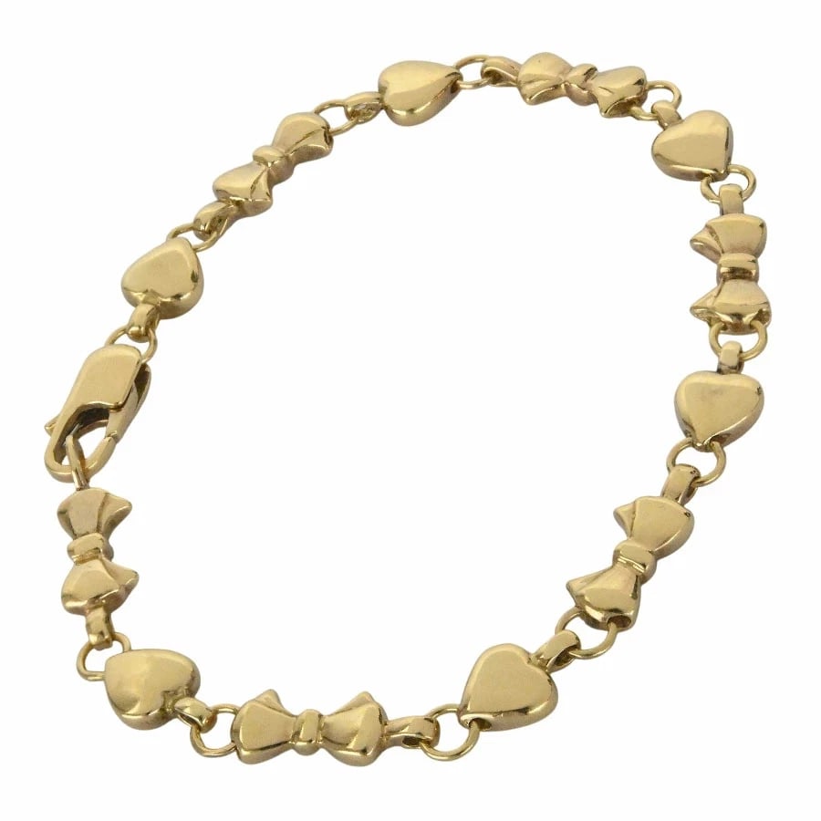 TIFFANY&CO. HEART RIBBON BRACELET 750: TIFFANY&CO. HEART RIBBON BRACELET 750 Brand: Tiffany & Co. Type: BRACELET Material: 18K Yellow Gold, Color: Yellow Gold Size: Arm circumference: Approximately 17.5cm Total length: 18cm Accessorie