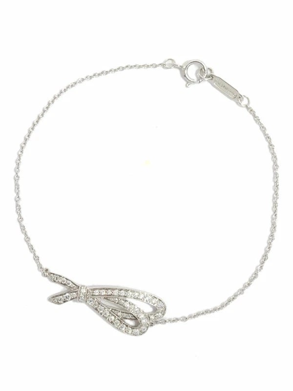 TIFFANY & CO. 18K WHITE GOLD BOW BRACELETH: TIFFANY & CO. 18K WHITE GOLD BOW BRACELETH Brand: Tiffany & Co. Type: BRACELETH Material: K18WG, Color: WHITE GOLD Size: Wrist circumference: Approx. 15.5cm (total length: Approx. 16cm) Motif: Approx.