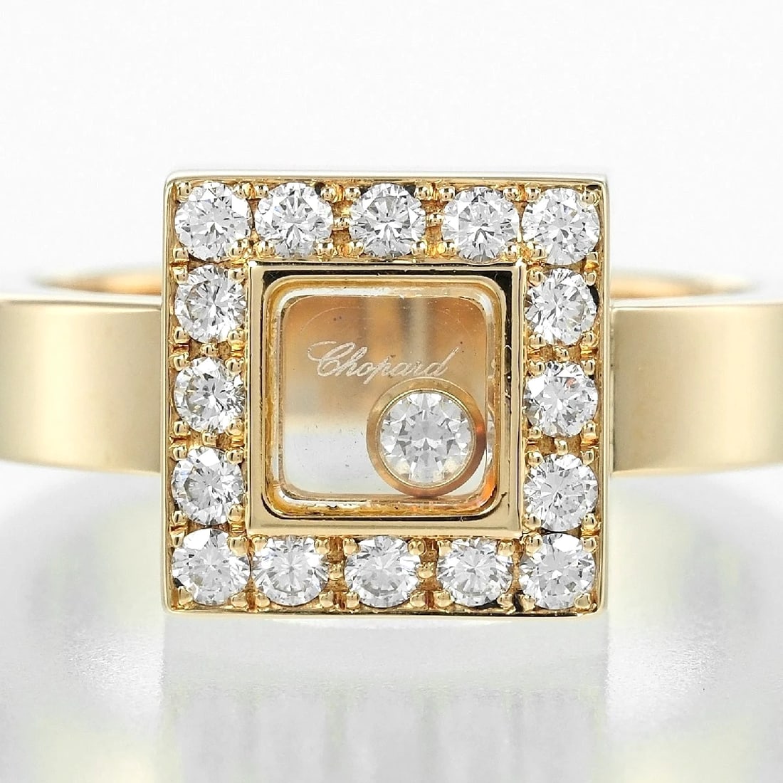 CHOPARD HAPPY SQUARE BAND RING: "Chopard Happy Square Band Ring Brand: Chopard Type: Ring Material: 18K Yellow Gold, Color: Yellow Size: US6.5 Accessories: None Accessories Notice: When purchasing pre-owned goods, pleas