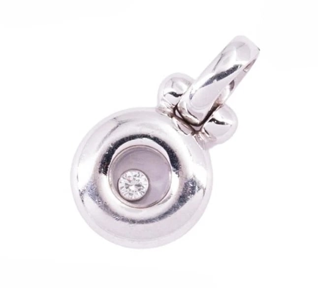 CHOPARD HAPPY DIAMOND 1 FLOATING PENDANT TOP: "Chopard Happy Diamond 1 Floating Pendant Top Brand: Chopard Type: Pendant Material: 18K White Gold, Color: White Size: Size: Approx. 11 × 18 mm (0.43 × 0.71 in) Accessories: None Accesso