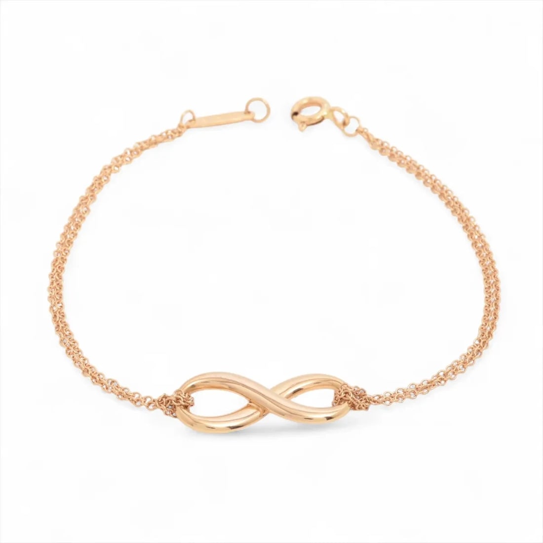 TIFFANY INFINITY BRACELET 750(PG): Tiffany Infinity Bracelet 750(PG) Brand: Tiffany Type: Bracelet Material: 750(PG), Color: pink Gold Size: Size(CM)Bracelet length:16.2 Accessories: None Accessories Notice: When purchasin