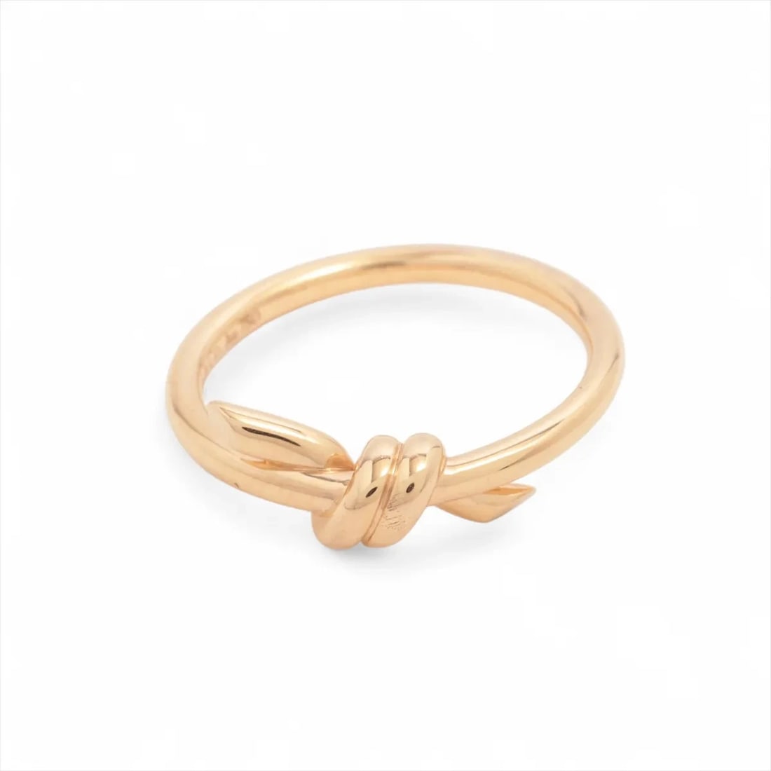TIFFANY KNOT RING 750(PG): Tiffany Knot Ring 750(PG) Brand: Tiffany Type: Ring Material: 750(PG), Color: pink Gold Size: 4.5 US Accessories: None Accessories Notice: When purchasing pre-owned goods, please refer to