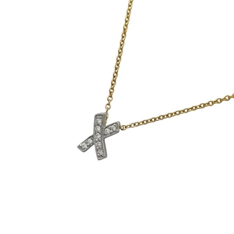 TIFFANY & CO. KISS 750YG PT950 NECKLACE: Tiffany & Co. Kiss 750YG Pt950 Necklace Brand: Tiffany & Co. Type: Necklace Material: Au750/Pt950 Main Stone/Creation Natural Color: Yellow gold/platinum Size: Length: Approx. 8.9mmWidth: Approx. 6mmC