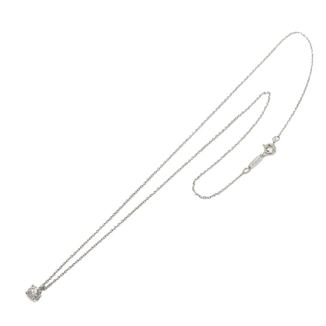 TIFFANY & CO. SOLITAIRE NECKLACE PLATINUM: Tiffany & Co. Solitaire Necklace Platinum Brand: Tiffany & Co. Type: Necklace Material: Platinum, Main Stone/Creation Natural Color: Platinum Size: Neck circumference: Approximately 42 cm (non-adjusta