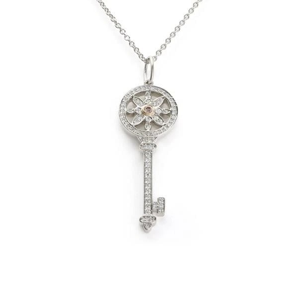 TIFFANY & CO. KEY DAISY PT950 NECKLACE: Tiffany & Co. Key Daisy PT950 Necklace Brand: Tiffany & Co. Type: Necklace Material: PT950K18 pink gold, Main Stone/Creation Natural Color: Platinum / Pink Gold Size: Motif size: 27mm x 10mmChain size
