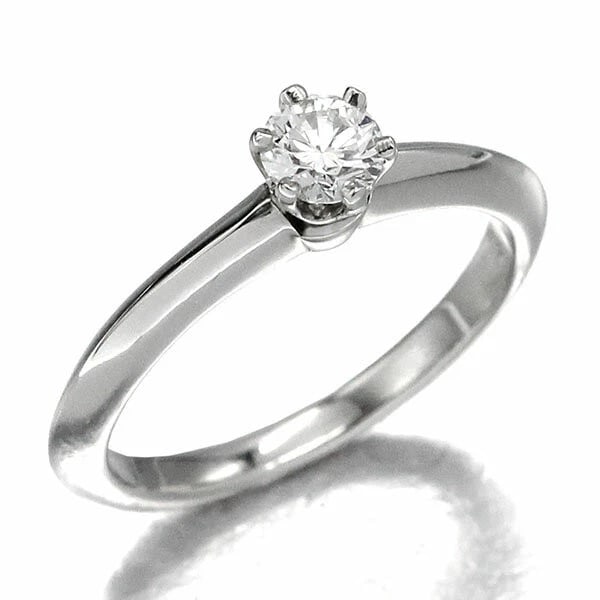 TIFFANY & CO. SOLITAIRE RING: "Tiffany & Co. Solitaire Ring Brand: Tiffany & Co. Type: Ring Material: Pt950, Main Stone/Creation Diamond Color: Silver Size: 3.5 US Accessories: None Accessories Notice: When purchasing