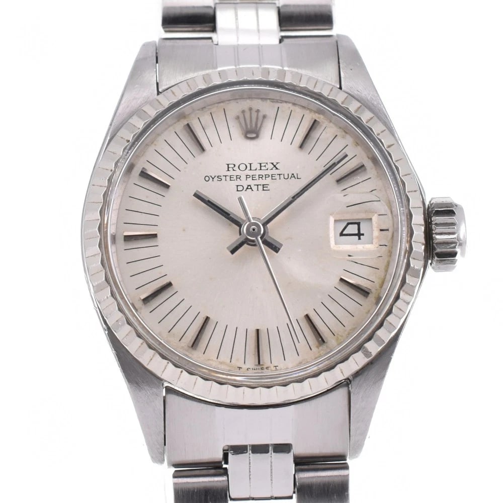 ROLEX OYSTER PERPETUAL DATE WATCH: ROLEX Oyster perpetual date Watch Brand: ROLEX Type: Wristwatch Material: Case Material Stainless Steel, Band Material Stainless Steel Color: Case Color Silver, Dial Color Silver, Band color Silver Si