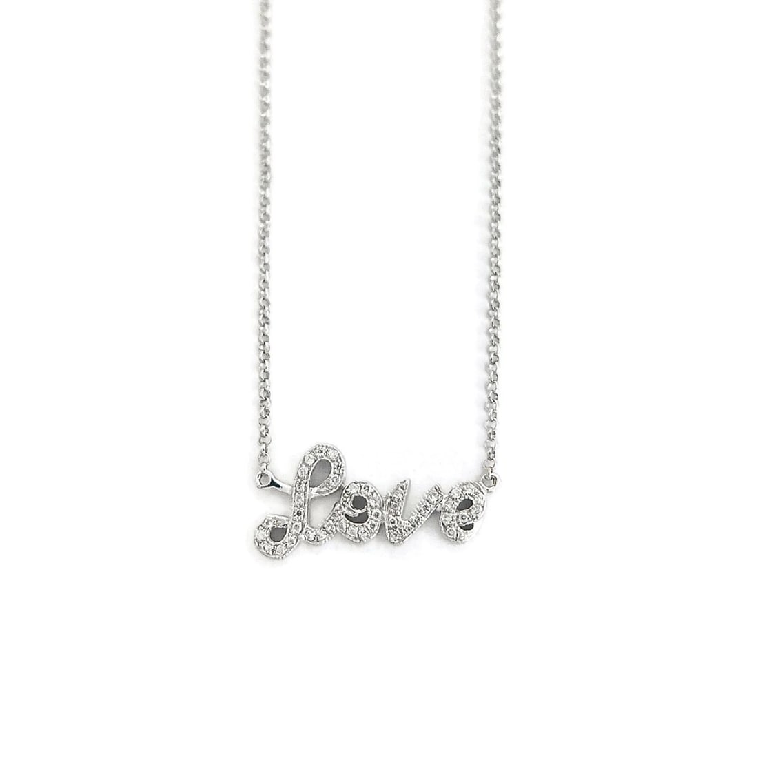 PAVE DIAMOND LOVE PENDANT NECKLACE 14K WHITE GOLD: Pave Diamond Love Pendant Necklace 14K White Gold Brand: Unbranded Type: Necklace Material: 14K white gold, Main Stone/Creation Natural Color: Silver Size: Length: 16.25 inches Pendant: 8.5 mm x 17.8 